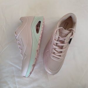 Skechers street with air colored memory foam.